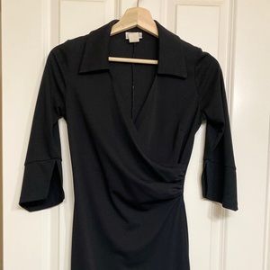 Black v-neck dress with a side-ruche